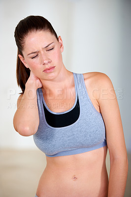 Buy stock photo Neck pain, woman and injury with exercise, fitness or training for wellness, healthy body and health. Person, athlete and distressed, moody or unhappy with bruise, strain or overwork from workout