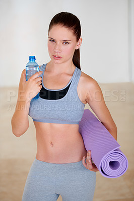 Buy stock photo Serious, fitness and portrait of woman drinking water for pilates workout or exercise in gym. Confident, sports and thirsty female athlete enjoying hydration beverage for training at health class.