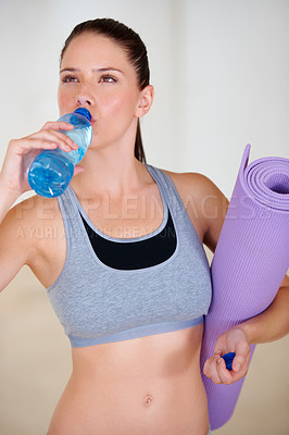 Buy stock photo Health, fitness and young woman drinking water for pilates workout or exercise in gym. Nutrition, sports and thirsty female athlete enjoying hydration beverage for training at wellness class