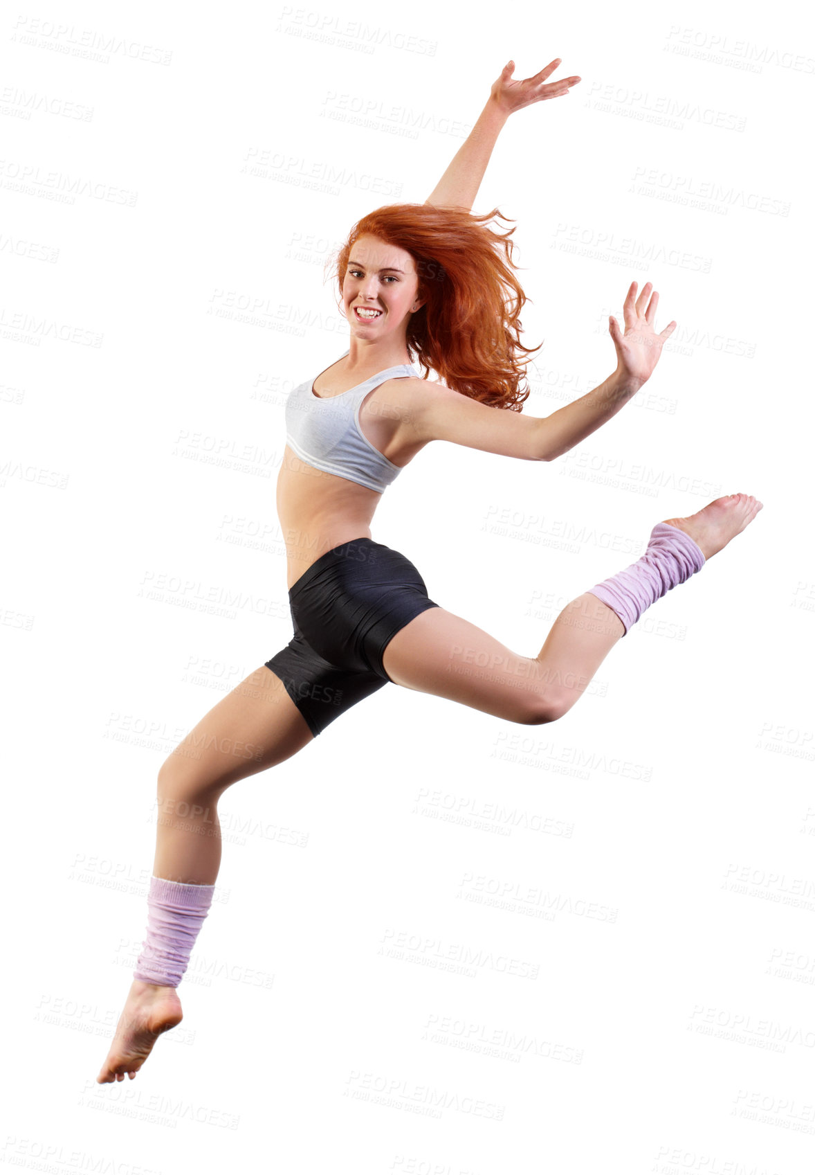 Buy stock photo Young dancer jumping against a white background