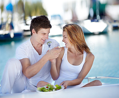 Buy stock photo Travel, food and couple on yacht with salad smile on summer holiday, vacation and adventure by sea. Happy, vegan and man and woman eating healthy on luxury cruise for journey, romantic trip and date