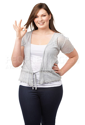 Buy stock photo Portrait, perfect or ok with a plus size woman in studio isolated on a white background for feedback. Fashion, hand gesture and a happy young body positive model looking confident with her review