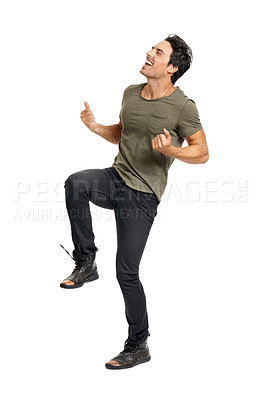 Buy stock photo Man, happy and jumping for celebration, excited and energy by white background in studio. Male person, freedom and victory or winner, carefree and ecstatic for achievement in competition or joy