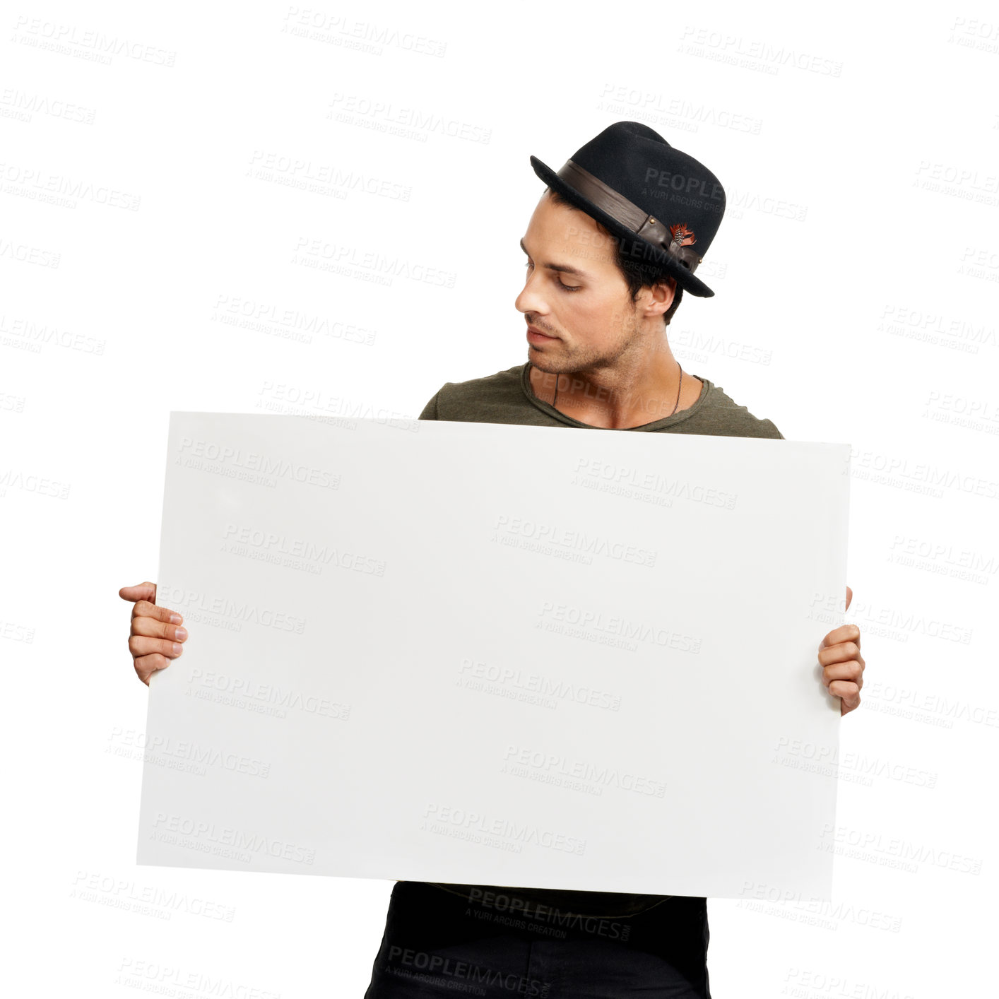 Buy stock photo A handsome young man holding a placard