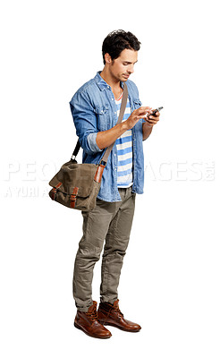 Buy stock photo A handsome young man standing against a white background while texting someone