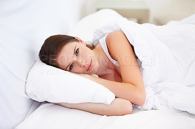 Buy stock photo Portrait, home and bedroom with woman, resting and relax with weekend break, lazy and healthy. Face, person and apartment with girl, pillow and peace with freedom, cushion and blanket with wellness