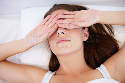 Buy stock photo Fatigue, wake up or tired woman in bed with hands on eyes frustrated with insomnia, crisis or disaster. Bedroom, burnout or lady person in house with sleeping issue, struggle or low energy from above