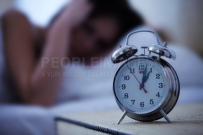 Buy stock photo Alarm, clock and frustrated woman in a bed with hands on ears for noise, sound or alert at home. Time, bell and female person in a bedroom blur with fatigue, burnout or sleeping late from insomnia
