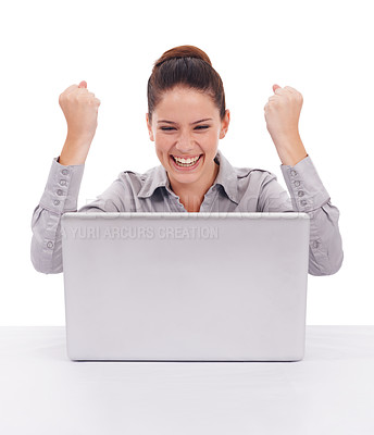 Buy stock photo Shot of a ecstatic-looking young woman seated in front of a laptop isolated on white