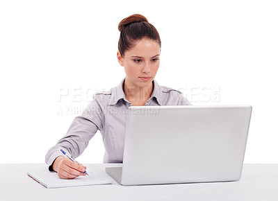 Buy stock photo Laptop, planning and a business woman writing on a notepad for research while working in her office. Computer, schedule and reading with a young female employee in studio isolated on white background