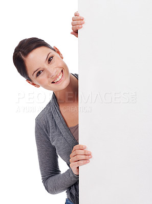 Buy stock photo Billboard mock up, portrait and happy woman peek at news banner, advertising signage space or commercial poster. Studio placard, sales discount mockup and female person isolated on white background