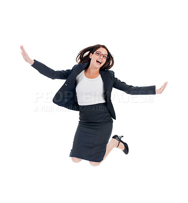 Buy stock photo Studio shot of an ecstatic looking businesswomen jumping for joy isolated on white