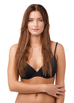 Buy stock photo Cropped shot of an attractive young woman posing in lingerie against white background