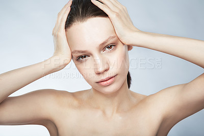 Buy stock photo Glow, face portrait and a woman with beauty from skincare isolated on a white background in a studio. Serious, young and a female model for dermatology and cosmetics on a backdrop for care of skin