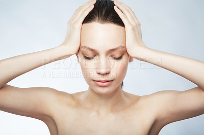 Buy stock photo Woman, beauty and hands on head for hair care, skincare or cosmetics treatment on gray studio background. Girl, face and closed eyes to relax at spa for scalp, body and facial massage or selfcare