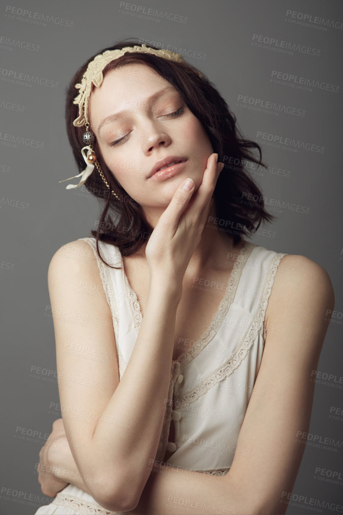 Buy stock photo Fashion, natural beauty and woman with eyes closed in studio isolated on a gray background. Beautiful, vintage clothes and female model with retro style, headband and skincare for healthy skin.