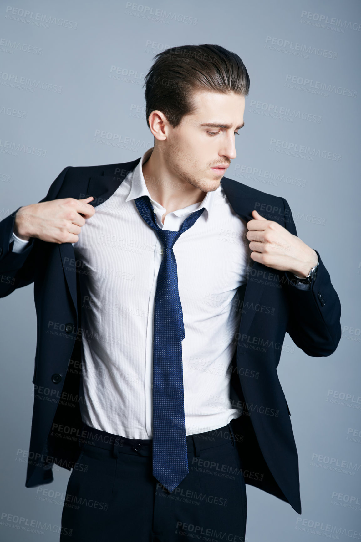 Buy stock photo Elegant, fashion and a man in a suit for business isolated on a dark background in a studio. Thinking, corporate and a businessman with style for executive, professional and career as a boss