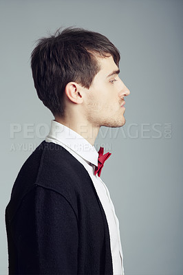 Buy stock photo Profile, business and fashion with man, thinking and confident guy on grey studio background. Person, entrepreneur or model with stylish outfit, elegant clothes or worker with professional or bow tie