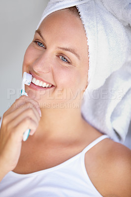 Buy stock photo Woman, brushing teeth and smile for healthy in bathroom for hygiene mouth, gum dental care or wellness. Female person, toothbrush and whitening routine for orthodontics, oral glow or gingivitis shine