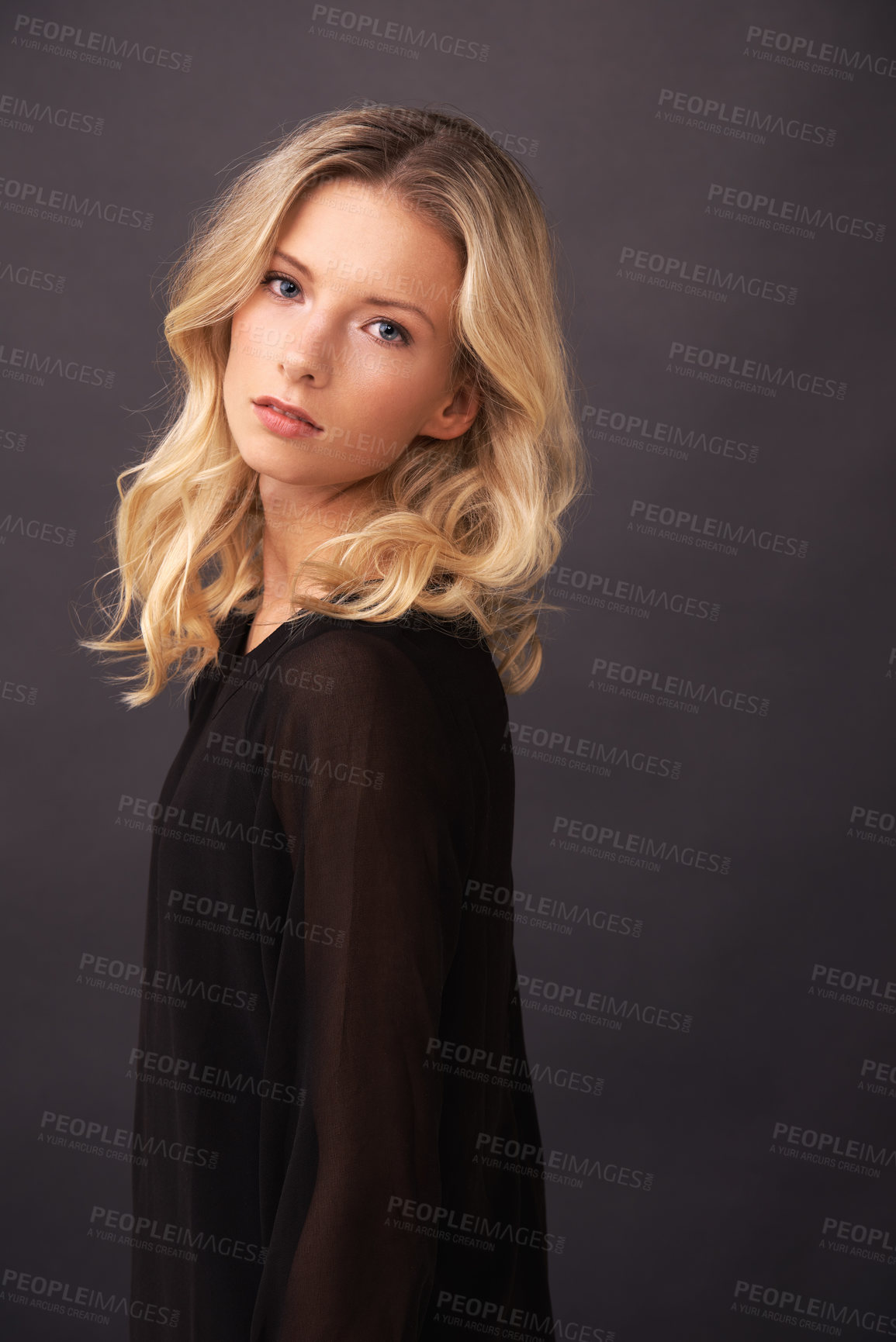 Buy stock photo A gorgeous blonde model posing in studio