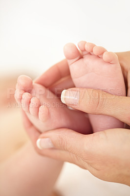 Buy stock photo Woman, child and feet closeup for connection or childhood love bonding, motherhood or newborn. Female person, infant and toes or care support for kid growth development, parent trust or nurture youth