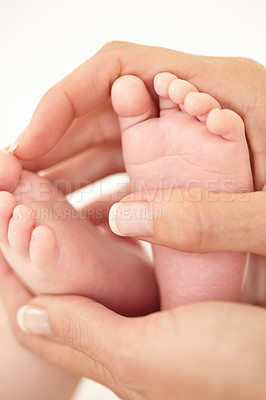 Buy stock photo Woman, child and feet closeup for holding love or childhood bonding, motherhood or newborn. Female person, infant and toes or care support for kid growth development, parent trust or nurture youth