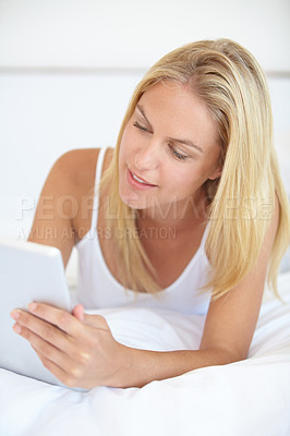 Buy stock photo Home, internet and woman with a tablet, typing and communication with network, social media and relax. Person, apartment and girl with technology, connection and digital app with a smile and bedroom