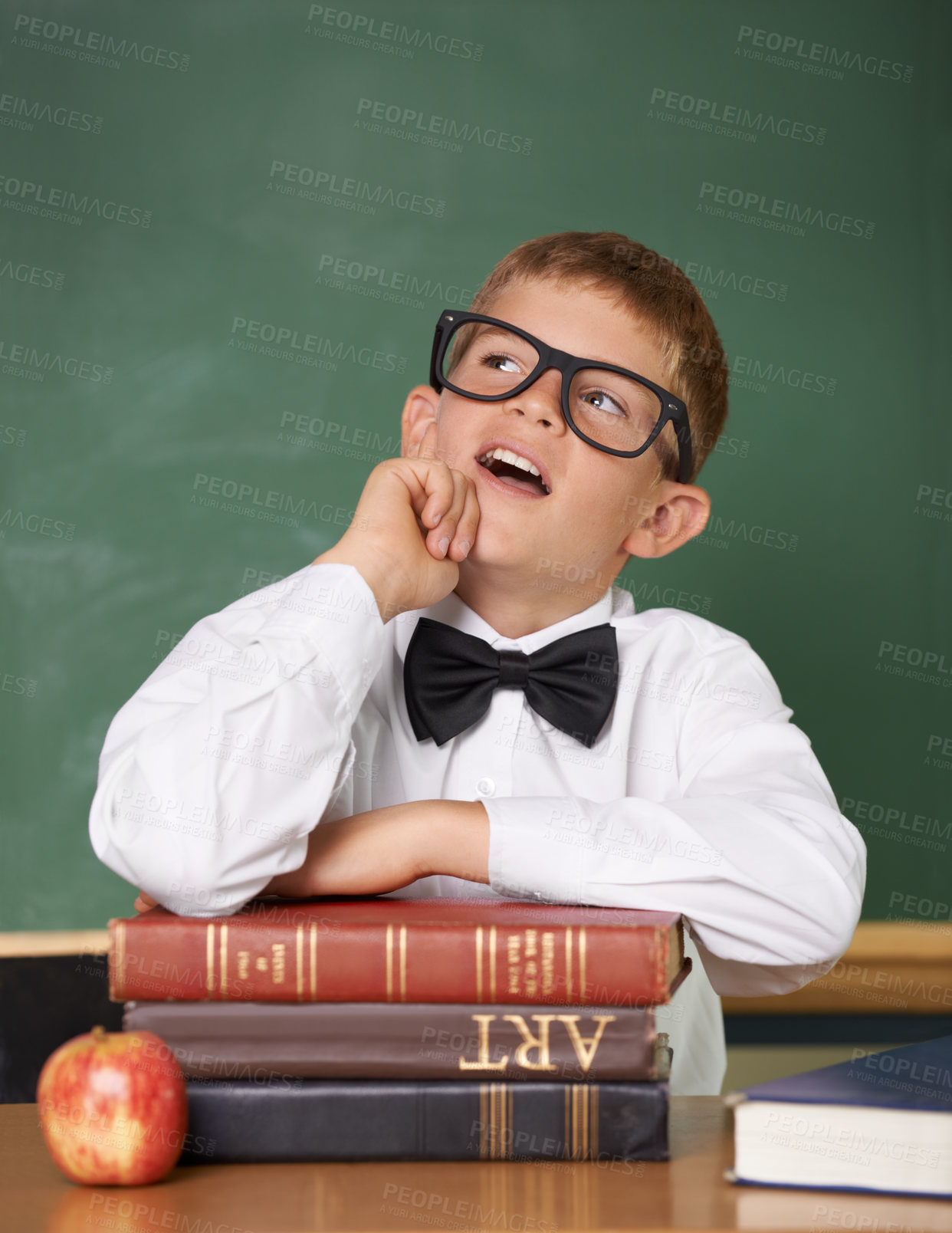 Buy stock photo Boy child, books and classroom with thinking, ideas or information for knowledge, solution and school. Student, problem solving and brainstorming for education, learning or development with glasses