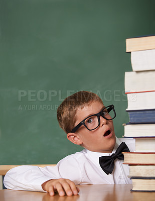 Buy stock photo Child, surprise and portrait with stack of books in classroom for education, language learning and knowledge. Kid or student in glasses and shocked or wow for school, reading list and study mockup