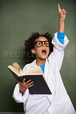 Buy stock photo Child, hand for answer and book in classroom, education and science learning or physics knowledge by chalkboard. African student wow with glasses and solution or problem solving in textbook at school