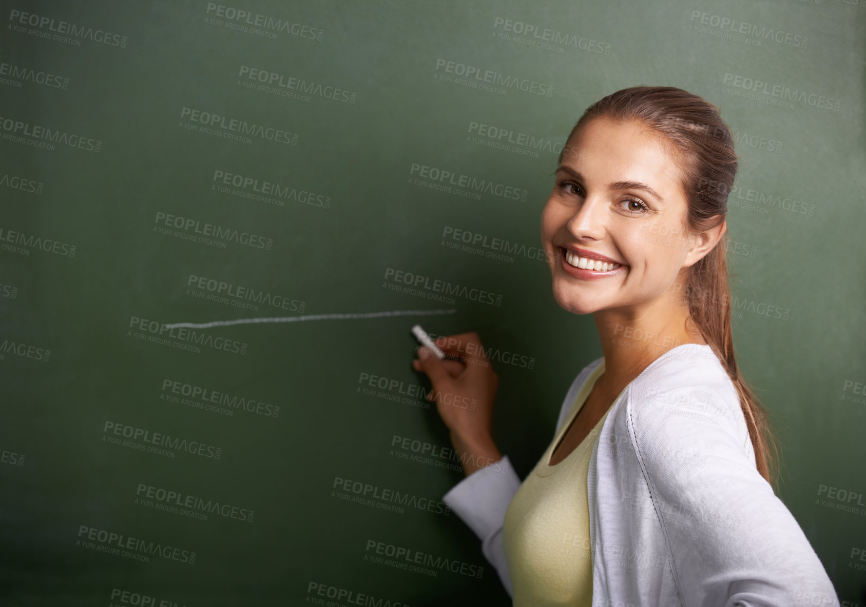 Buy stock photo Woman, teacher portrait and drawing on chalkboard for education, learning information and teaching. Face of a young professor, lecturer or class educator writing a line on board for school knowledge 
