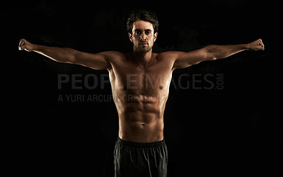 Buy stock photo Arms raised, black background or topless man for workout, training or exercise in studio for fitness. Model, dark shadow or ripped male person with healthy body, six or stomach for wellness in Italy 