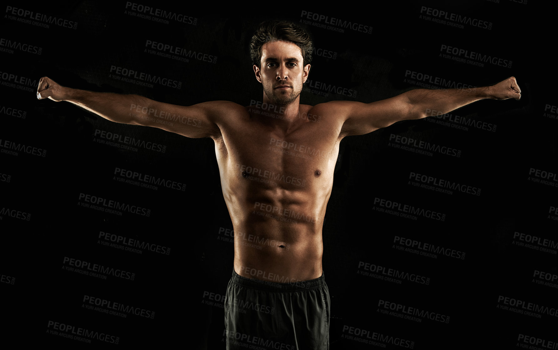 Buy stock photo Arms raised, black background or topless man for workout, training or exercise in studio for fitness. Model, dark shadow or ripped male person with healthy body, six or stomach for wellness in Italy 
