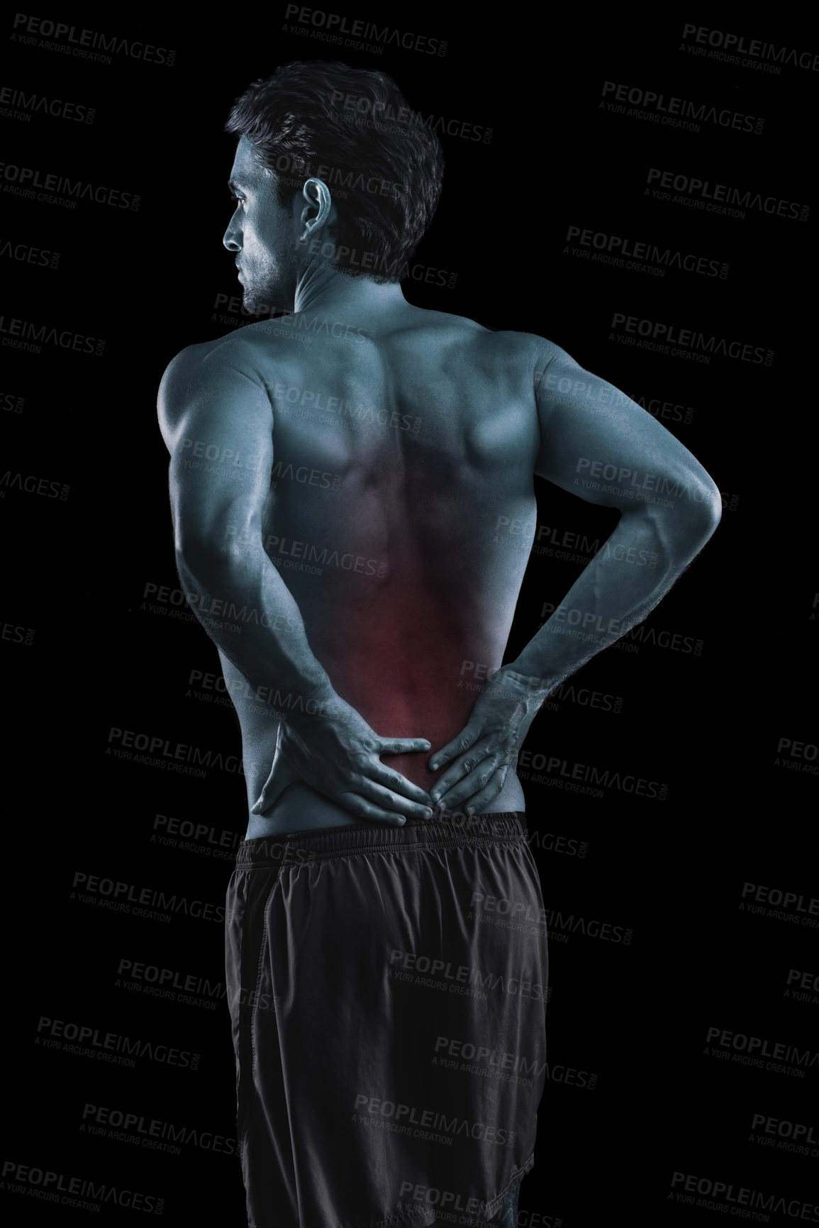 Buy stock photo Muscular young man with lower back pain