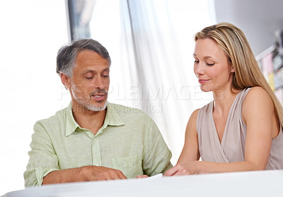 Buy stock photo Mature, designer and discussion in meeting with project, collaboration and woman with creativity. People, talking and planning on paper for a decision in Australia, office and interior design agency