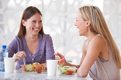 Buy stock photo Salad, friends or women at lunch for happiness or smile on break to relax together for funny joke. Conversation, healthy or colleagues laughing at table in cafeteria for eating fruit or communication