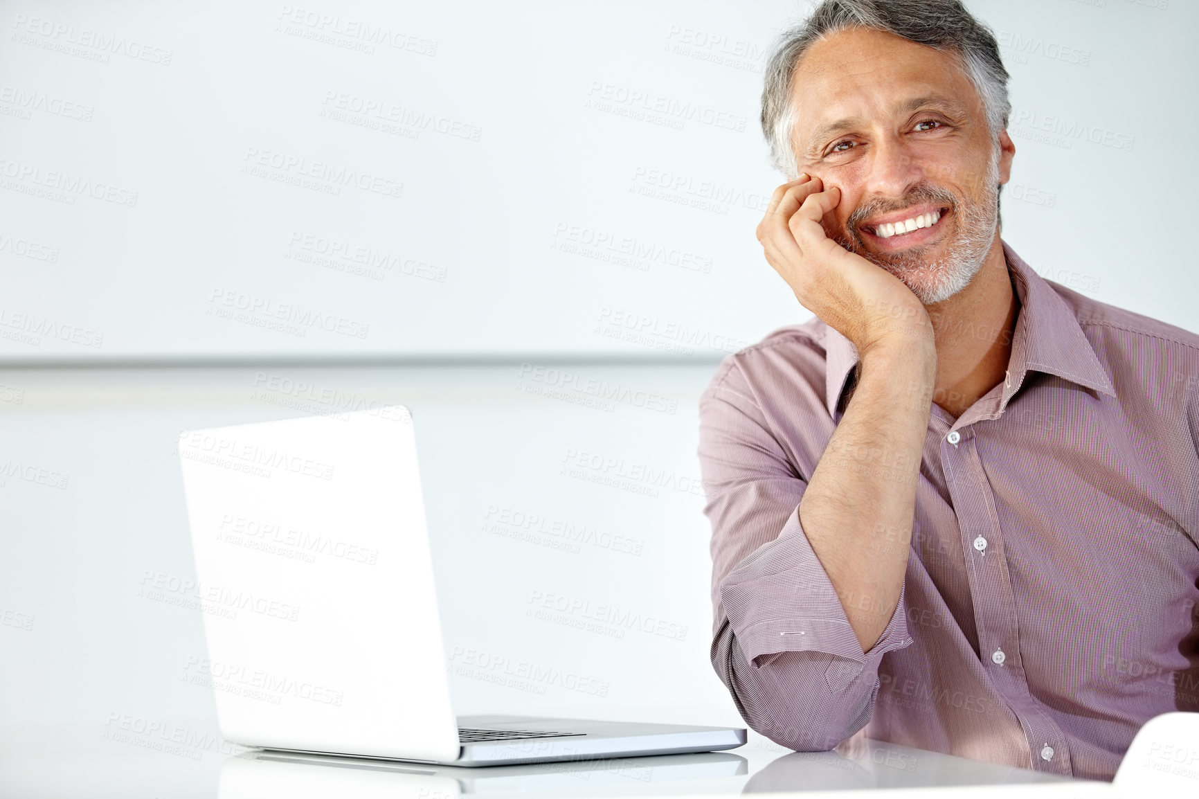 Buy stock photo Mature man, portrait and smile laptop in office to review online research, website connection and project management at desk. Happy entrepreneur, business manager and working on computer with pride 