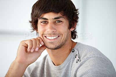 Buy stock photo Handsome young man smiling while against a white background - copyspace