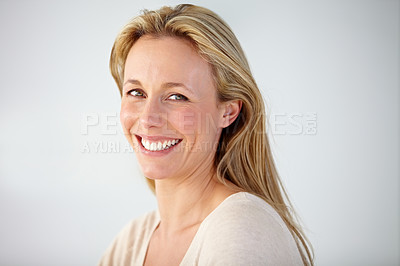 Buy stock photo Portrait of a beautiful businesswoman sitting in the office