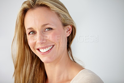 Buy stock photo Portrait, smile and mature woman in studio with natural beauty for break, rest and confident personality on white background. Face of happy model with good mood, pride and optimism at mockup space 