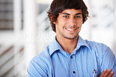 Buy stock photo Portrait, smile and a business man arms crossed in his office for an internship as a confident designer. Face, mindset and a happy young employee in a company workplace or startup design agency