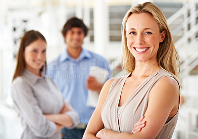 Buy stock photo Manager, happy and portrait of business woman with team for leadership, confidence and pride. Corporate office, company and worker with staff for meeting, planning and collaboration in workplace