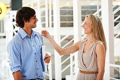 Buy stock photo Smile, funny and a mentor laughing with her employee in the office together for training or coaching. Collaboration, management and a happy business manager with a young intern for congratulations