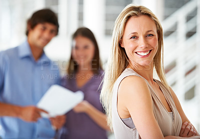 Buy stock photo Confident, crossed arms and portrait of business woman with team for leadership, company and pride. Corporate, office and mature happy worker for meeting, planning and collaboration in workplace