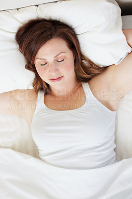 Buy stock photo Sleeping, rest and woman in bed from above, peaceful and enjoying a calm nap in her home. Top view, dreaming and female person in a bedroom for snooze, cozy and comfort on the weekend in a house