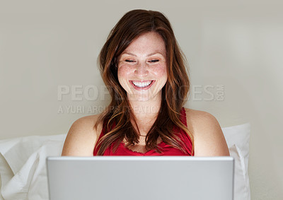 Buy stock photo Laptop, happy and woman on bed in home for social media, online search and email. Computer, bedroom and person smile on internet, reading blog or writing, typing and relax while streaming web video.