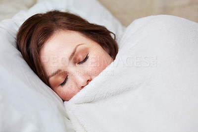 Buy stock photo Sleep, rest and woman in bed, peaceful and enjoying a calm nap in her quiet home. Eyes closed, dreaming and female person in a bedroom for snooze, cozy and comfort alone on the weekend in a house