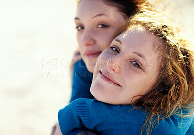 Buy stock photo Women hug, face and twins in portrait, happy with bonding and spending quality time together outdoor. Travel, smile and young female people, sisters and family with love and trust in relationship