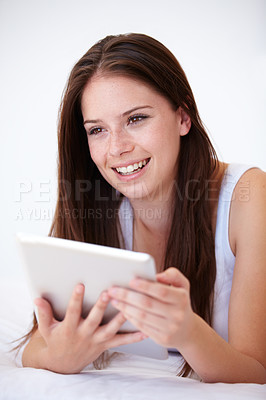 Buy stock photo Woman, tablet and thinking on bed of online search, social media and streaming service for film choice or movies. Happy young person with ideas or home inspiration on digital technology in bedroom