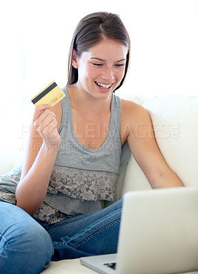 Buy stock photo Woman, credit card and laptop on sofa for online shopping sale, e commerce discount or cashback bonus at home. Excited person on couch and internet banking, web registration and typing on a computer
